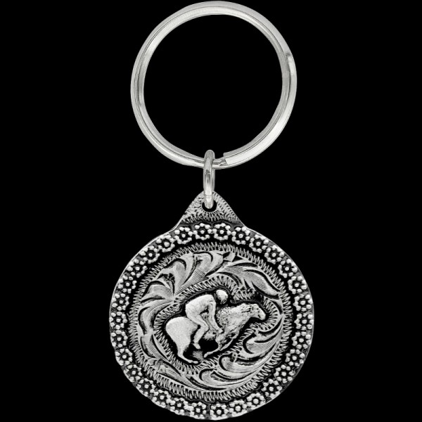 Mutton Busting Keychain, Get your bucaroo a Mutton Bustin’ Keychain! Made with a detailed berry border, a 3D mutton busing figure, and comes with a key ring attachment. Each 